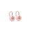 Pablo Earrings in Rose. Pink drops inlaid with green amethyst stones, on gold earwires. Angled view.