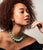 Model wears off-the-shoulder black top with Chrysoprase necklace and Duo Earrings in Pink Topaz and Green Amethyst.
