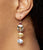 Close-up on model's ear wearing the Dame Earrings in Mixed Semiprecious.