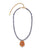 New Bloom Necklace in Peach. Faceted iolite beads and carved peach aventurine flower pendant set with pink amethyst.