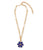 Desert Daisy Necklace in Lapis. Gold-plated chain link and graphic daisy pendant set with blue lapis and faceted citrine.