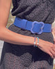 Video of model in black tank dress wearing Florence Belt in Azure and Santo Bracelets in Rose and Sea.